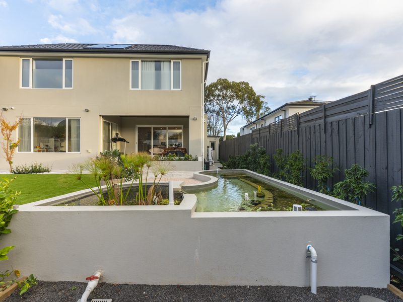 Backyard water feature with stone paving, Glen Iris VIC | MEG Outdoor