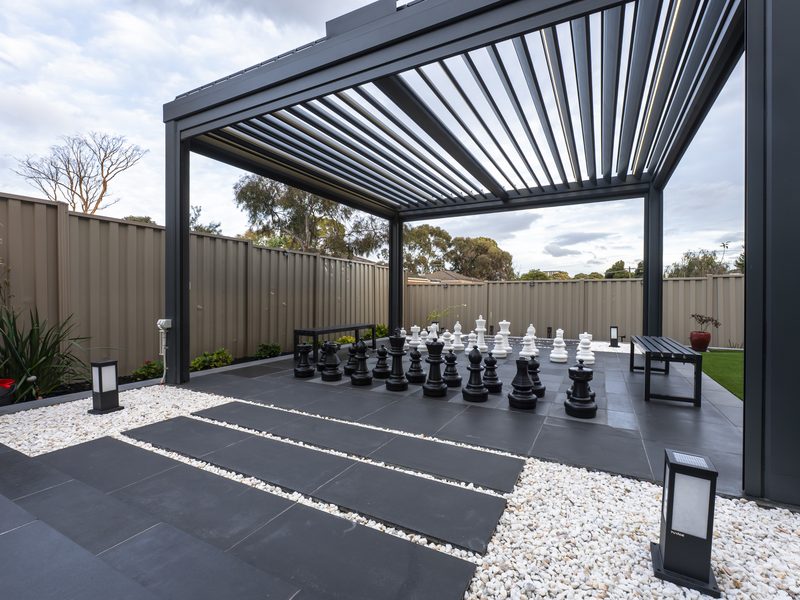 Aluminium pavilion with chess setting and artificial turf, Glen Waverley VIC | MEG Outdoor